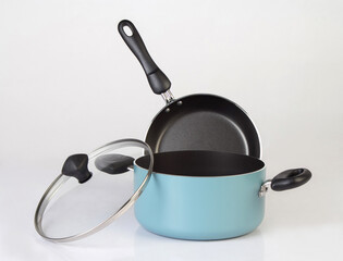 Set of non-stick pot and frying pan isolated on white background