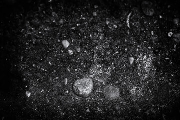 dirty pattern with pebbles and gravel in dark black and white version