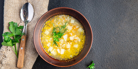 rice soup with vegetables ready to eat meal snack on the table copy space food background rustic. top view keto or paleo diet veggie vegan or vegetarian food no meat