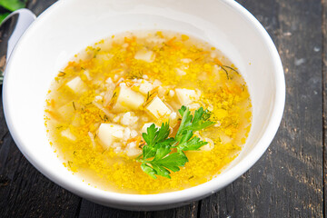 rice soup with vegetables ready to eat meal snack on the table copy space food background rustic. top view keto or paleo diet veggie vegan or vegetarian food no meat