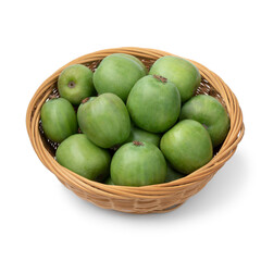 Basket with fresh whole kiwi berries close up isolated on white background  