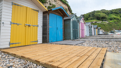 Beach huts at Beer Beach, South Devon UK