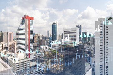 Forex and stock market chart hologram over panorama city view of Bangkok, the financial center in Southeast Asia. The concept of international trading. Double exposure.