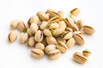 roasted pistachios on white background