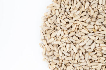 Sunflower seeds texture as background. Top view. Space for text.