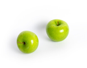 Juicy green apple on an isolated background.