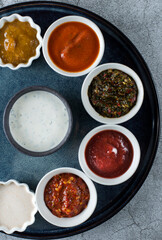 assorted sauces georgian cuisine on gray background