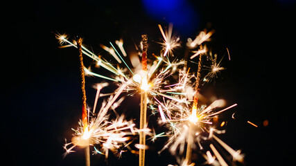 Sparkler light at night with a dark background