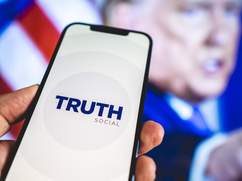Truth Social - Social network launched by former President of the United States of America - Micro blogging application, Twitter competitor - Logo mock-up on smartphone