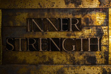 Inner Strength text on textured grunge copper and vintage gold background