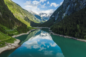 Aerial view of Gosau lake and Dachstein summit mountain range and visible glacier ice during summertime, Upper-Austria, Europe