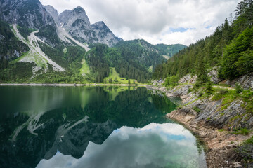 Obraz na płótnie Canvas Dachstein Mountains reflected in Gosau beautiful lake, Austria