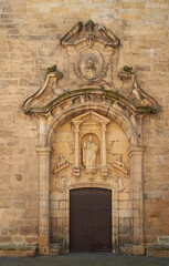 Fototapeta na wymiar The lateral doorway of the parish church of San Pedro Apostle. Pasaia, Gipuzkoa, Spain.