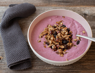 Breakfast bowl with fresh berry yogurt and homemade granola