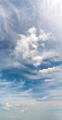 Fantastic clouds against blue sky, panorama