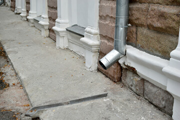 Iron downpipes on a house in the city
