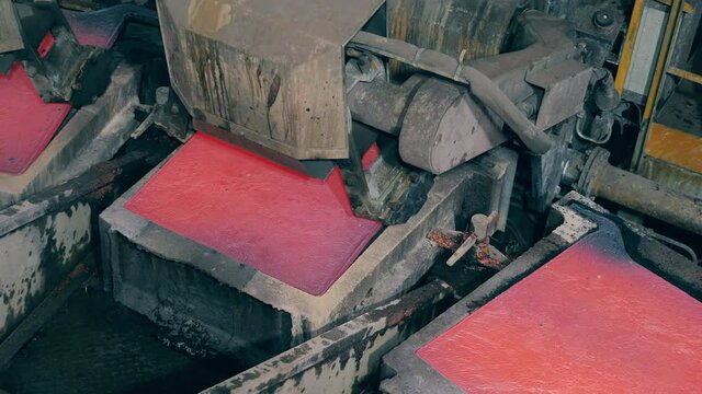 Copper anode plates are getting mechanically lifted from the molds