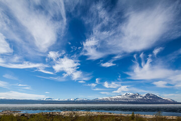 Cloudscape over the mountain range Akka and the lake Akkajaure in Stora Sjöfallet National Park, Lapland, Sweden