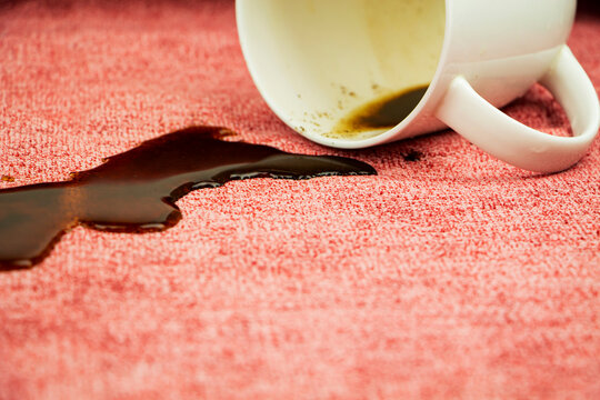 A spot on a light fabric, tablecloth, sofa. Washing, cleaning the fabric