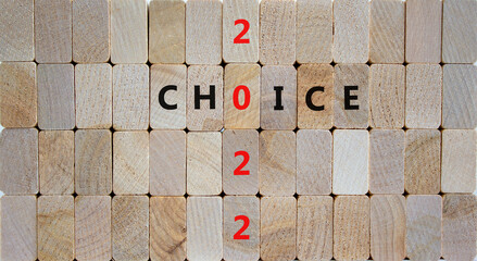 Planning 2022 choice new year symbol. Wooden blocks with words Choice 2022. Beautiful wooden background, copy space. Business, 2022 choice new year concept.