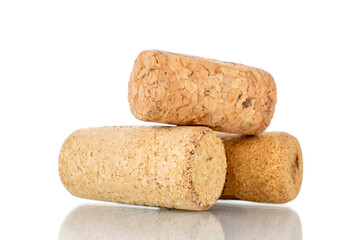 Three wine corks, close-up, isolated on white.