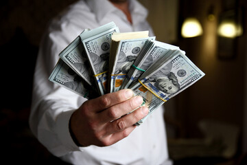 many  money dollars in the hands of a businessman