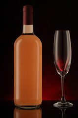 full wine bottle and glass