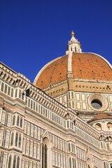Naklejka premium Detail of the Florence Duomo or Basilica di Santa Maria del Fiore in Florence, Italy, with the Dome dominating the backgrund, the most famous landmark by Filippo Brunelleschi.