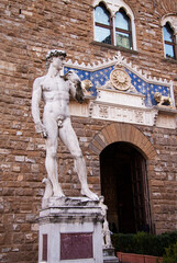 Statue of David by Michelangelo at the entrance of the Palazzo Vecchio (Old Palace) on Signoria...