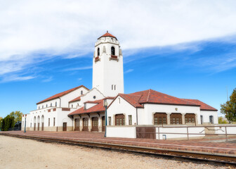 Fototapeta na wymiar Boise City train Depot with tracks and blue sky