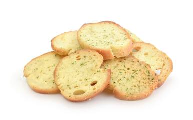 Croutons with herbs isolated on white.