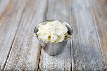 A view of a cup of compound butter.