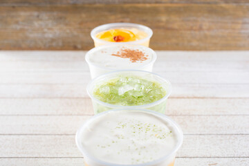 A view of the tops of popular Asian boba milk teas.