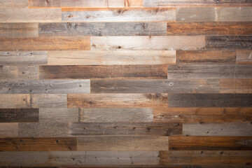 A view of a rustic wood panel facade wall.
