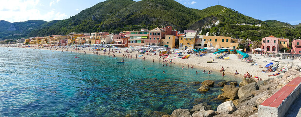 The beautiful beach of Varigotti with turquoise water - obrazy, fototapety, plakaty