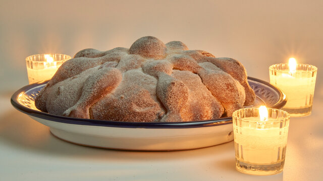 bread of the dead with candles for the altar of the day of the dead in mexico