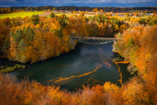 Autumnal scenery and the railway bridge in Rutki, Kashubia. Poland