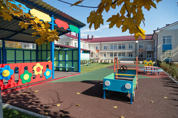 Children's playground of the new kindergarten at autumn