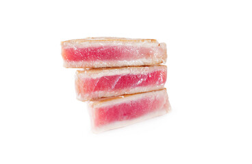 Rarely roasted tuna steaks close-up. Isolated on white background