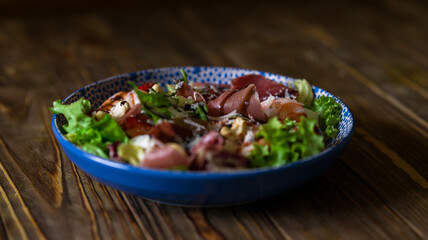 Delicious seafood salad. Large portion of food. Restaurant food