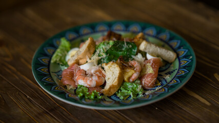 Salad with king prawns. Restaurant food. Takeout food.
