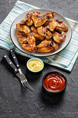 crispy fried chicken wings served on a plate