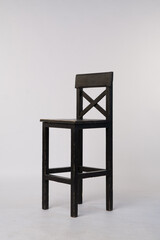 Wooden black chair on white background