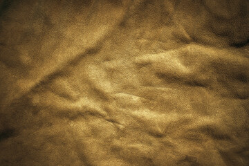 The texture of old genuine leather is gray. Crumpled leather fabric. Yellow leather background.