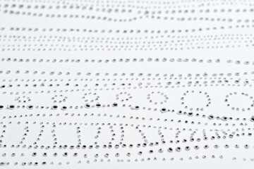 Texture of pierced paper. Simple dot pattern.