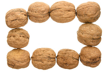 Frame from walnuts isolated on white background