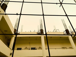 Building that is unfinished but actively being worked on.