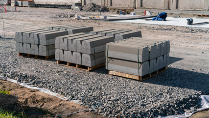 Construction site with building materials on a sunny day