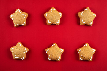 Christmas gingerbread stars on a red background,flay lay.