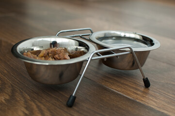 Wet food for dogs and cats in a bowl close up